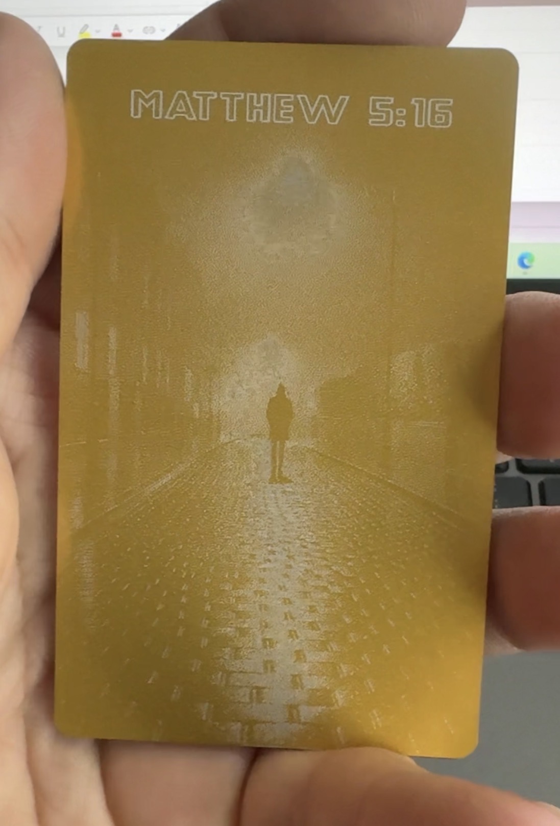 Back of gold anodized business card