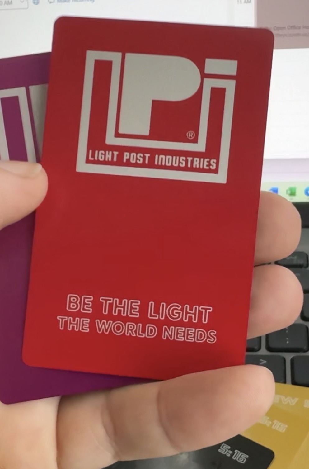 Red anodized aluminum business card